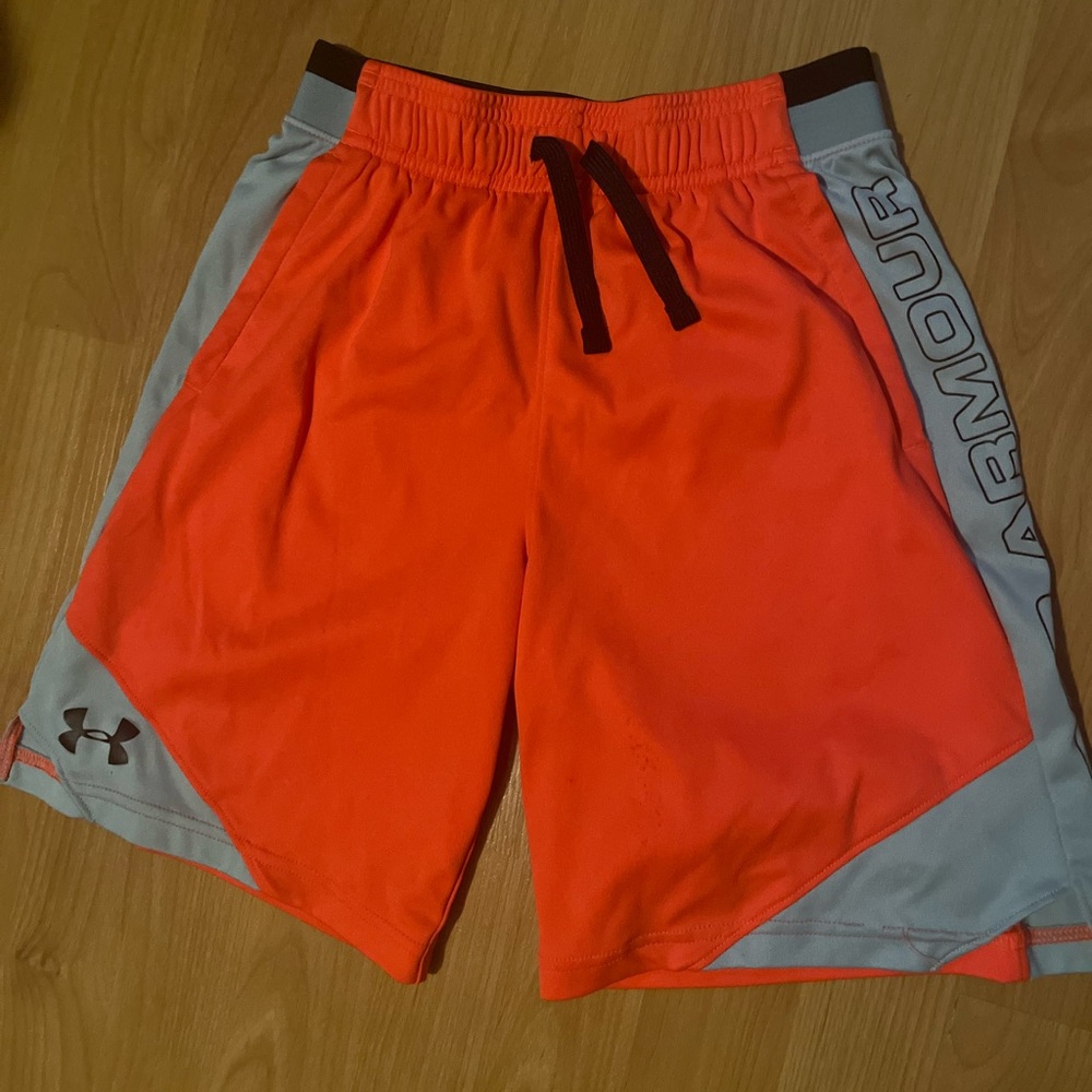 Boys Under Armour coral/pinkish color shorts